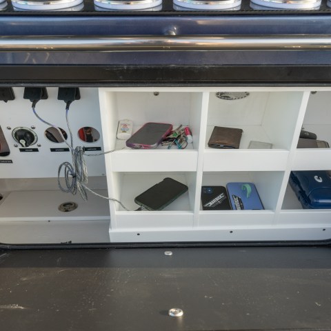 a stove top oven sitting inside of a car